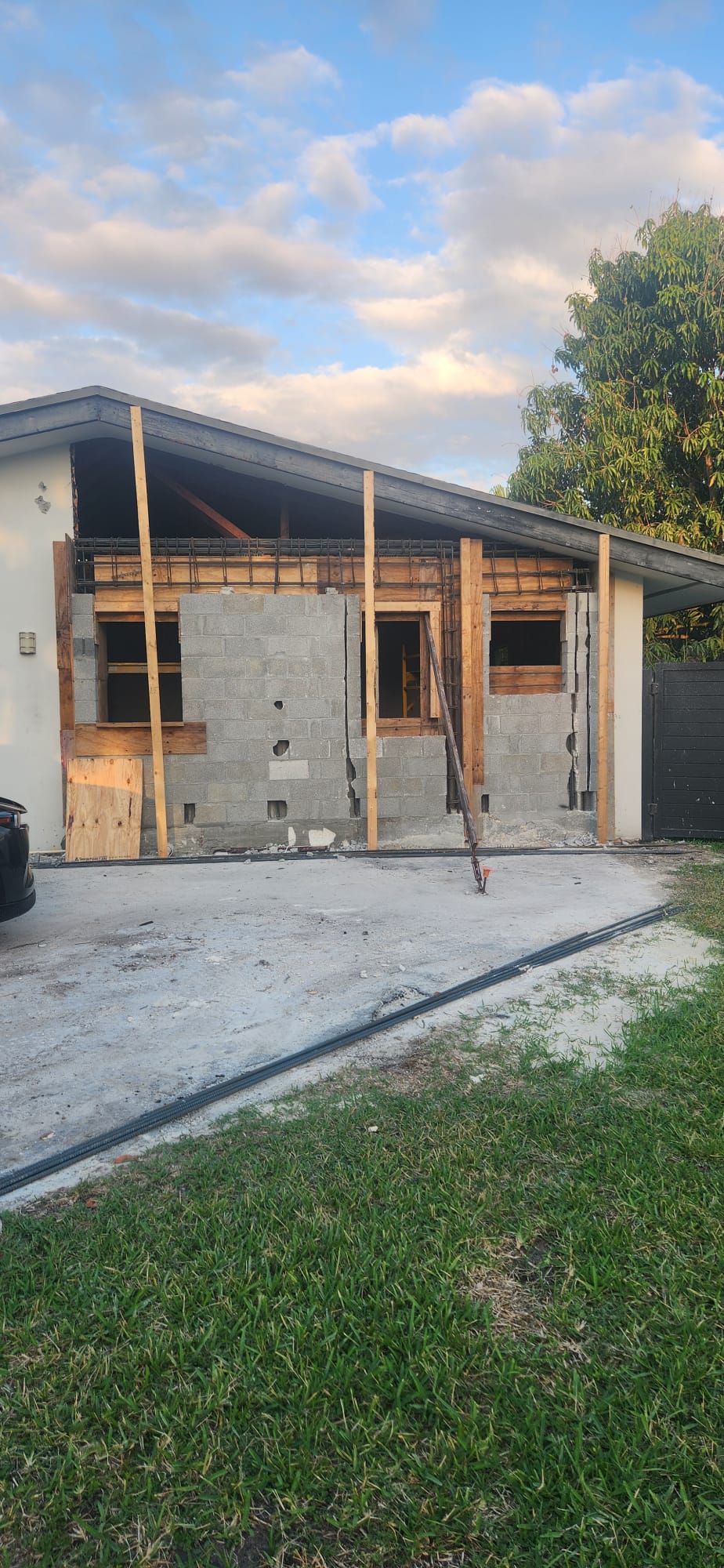 CMU block home addition under construction with window openings